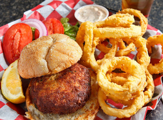 Crabcake sandwich with onion rings