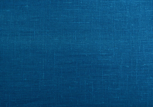 Classic blue fabric blank canvas, cotton or linen texture, 2020 fabric trendy color swatch for clothes, interior.