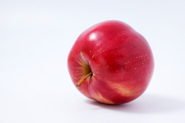 Fresh red apple fruit isolated on the white background with clipping path. One of the best isolated apples that you have seen.