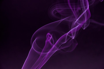 Colourful smoke fumes in different patterns on a black isolated background. Print for t-shirt.