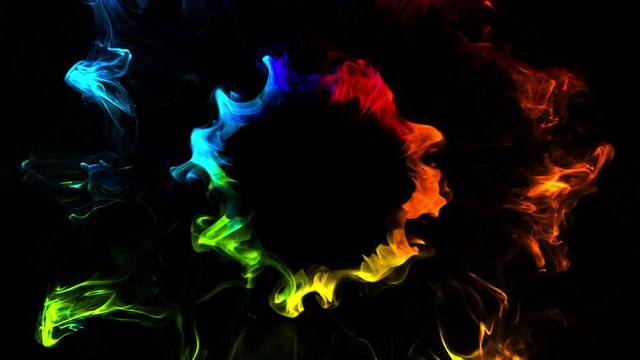 Multiple iridescent multicolored circle particle explosions. Vivid rainbow colored powder smoke pulsating shockwave paint. 4k logo copy space animation with alpha. Isolated on black VJ loop copyspace