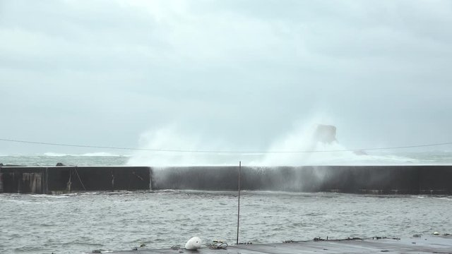 Waves Crash Into Sea Wall Day Before Hurricane Hits Island - Hagibis