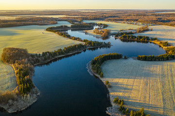 Aerial: a panorama view above the curvy lake