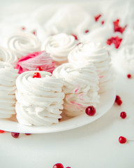 Handmade air russian fruit white marshmallow on a white background. Homemade Sweets.