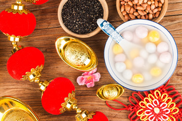 Fototapeta na wymiar Chinese Lantern Festival food，Chinese translation on Jin Yuanbao:Felicitous wish of making money