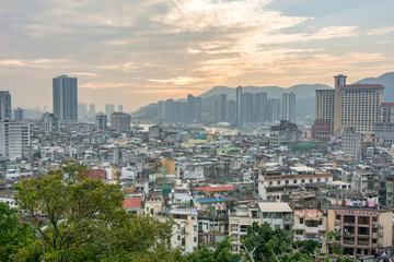 Fototapeta na wymiar Panoramic view of the cityscape of Macau, China. Modern and old buildings of Macao city.