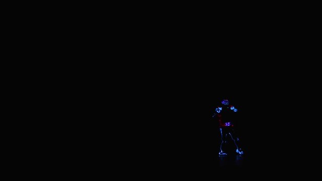 Dancer in LED costume on stage