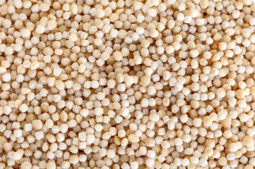 amaranth groats macro background, top view
