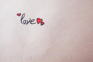 i love you written on a paper
