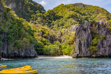 Sandy tropical beach among the rocks in El Nido Palawan Philippines
