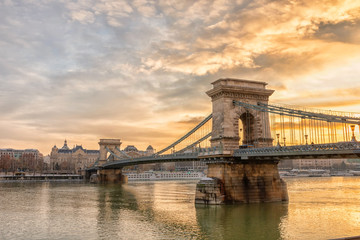 Fototapeta premium Panoramic view of Sechenyi bridge chain in winter frosty morning