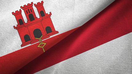 Gibraltar and Indonesia two flags textile cloth, fabric texture