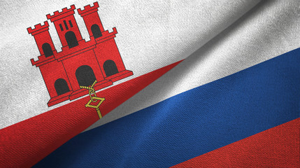 Gibraltar and Russia two flags textile cloth, fabric texture