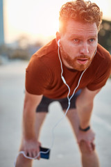 Fototapeta premium Modern young man working out in an urban park.