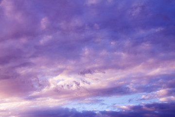 Naklejka na ściany i meble Purple sky with clouds