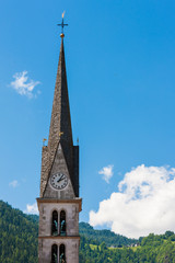 The bell tower of Alleghe in the Dolomites