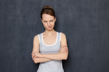 Portrait of thoughtful focused girl thinking intently, making choice