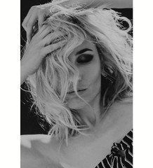 Portrait of a beautiful fashionable blonde woman black white photo