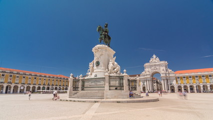 Fototapeta na wymiar Commerce Square in Lisbon timelapse hyperlapse, Portugal. Statue of of King Jose I in foreground