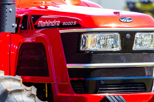 December 14, 2019, Brazil. Mahindra red tractor. It is a car company from India that manufactures cars and trucks