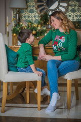 Nice mom and little boy at Christmas time, children and parents lifestyle