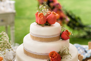 white wedding cake with green background