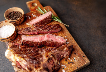 two grilled steaks with spices, with two types of frying with copy space for your text