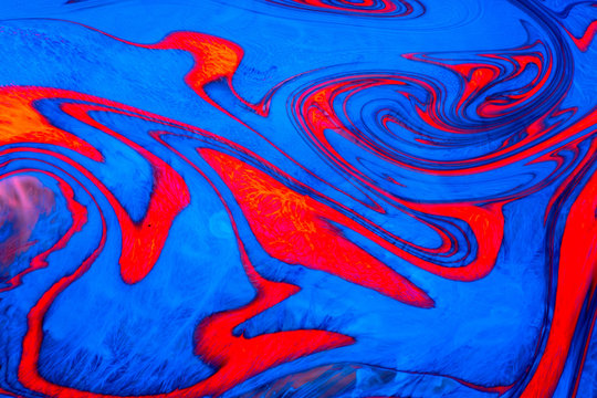 Ebru art. Colored acrylic paint on the water