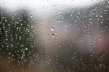 Blurred background of drops on the window. Abstract background.	