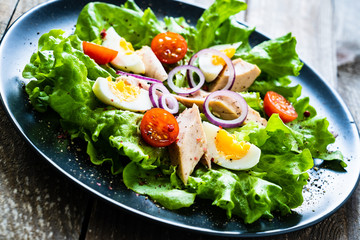 Tuna salad on wooden table