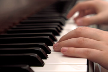 Boy and Grandfather playing piano