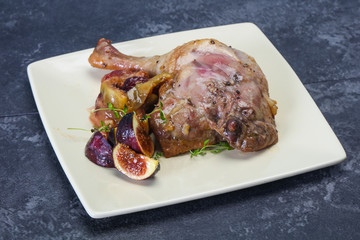 Roasted. duck. leg with plum and apple