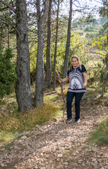 Fototapeta premium Woman doing hiking