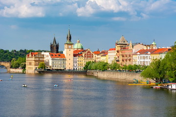Fototapeta na wymiar Prague cityscape with Old Town Bridge Tower and Vltava river, Czech Republic