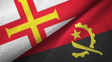 Guernsey and Angola two flags textile cloth, fabric texture