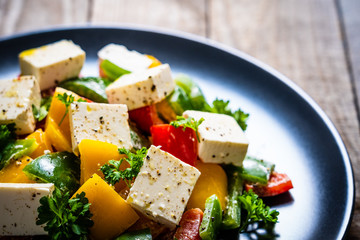  Fresh greek salad on wooden background