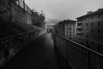 Gray morning in Perugia. Streets of Perugia at sunrise. Black and white Umbria. Italy.