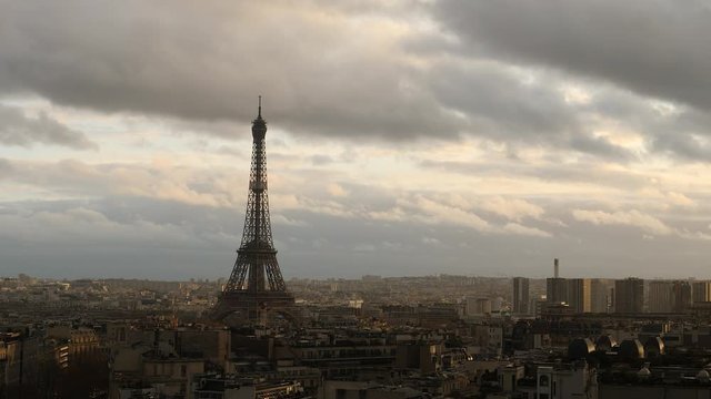 Cinematic skyline of Paris with Eiffel tower.