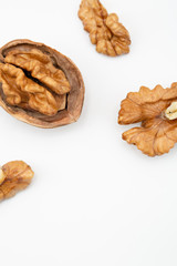 Walnuts isolated on white backgroun from top view.
