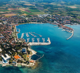 Old coastal city Umag in Croatia, aerial view. Istria, Europe.
