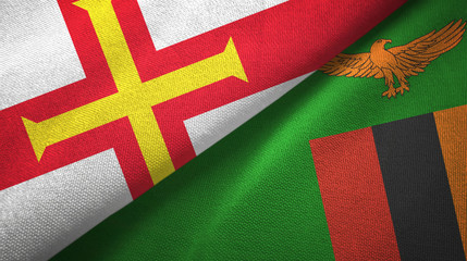 Guernsey and Zambia two flags textile cloth, fabric texture