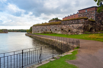 Fototapeta na wymiar Helsinki. Finland. Suomenlinna Fortress. Stone walls of the fortress of Sveaborg. Travelling to Helsinki. An ancient fortress in Scandinavia on the Islands. Sightseeing In Helsinki.