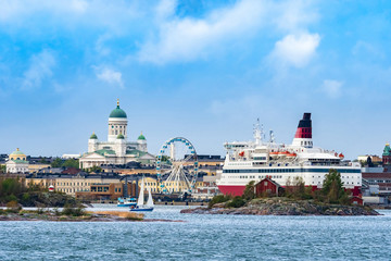 Helsinki. Finland. Ferris wheel. Suurkirkko. Cathedral Of St. Nicholas. Small and large ships in the Harbor of Helsinki. Sea travel in Europe. View of the capital of Finland. Gulf of Finland.