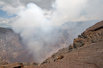 Masaya Volcano emitting large quantities of sulfur dioxide gas from active Santiago crater in...