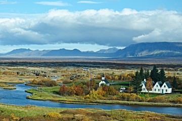 Fototapeta na wymiar Iceland-view of Thingvellir church and houses next to church