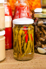 Pickled hot chili peppers in a jar 