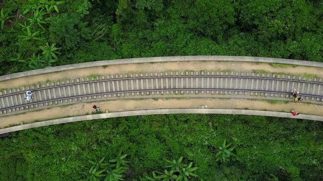 Aerial view of Nine Arches Bridge with ceylon tea plantation landscape, Famous tourist attraction in Ella, Sri Lanka. Travel South Asia. 4K Drone Video