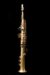 soprano saxophone on black background