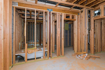 Bathroom showing plumbing work connecting installation of pipes with basement