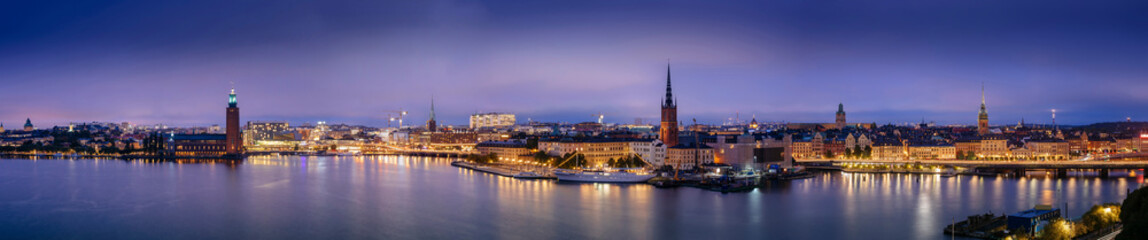 Fototapeta na wymiar Sweden, Sotckholm City Skyline During Late Sunset, view from Old Town pier to Sodermalm district